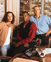 Jim, Blair and Simon at Simon's desk